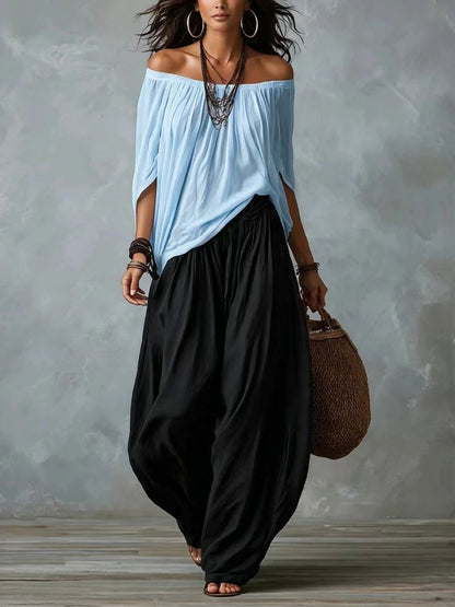 Marta | Completo de Top Blanco Off-the-shoulder y Pantaloni Lantern Holgados