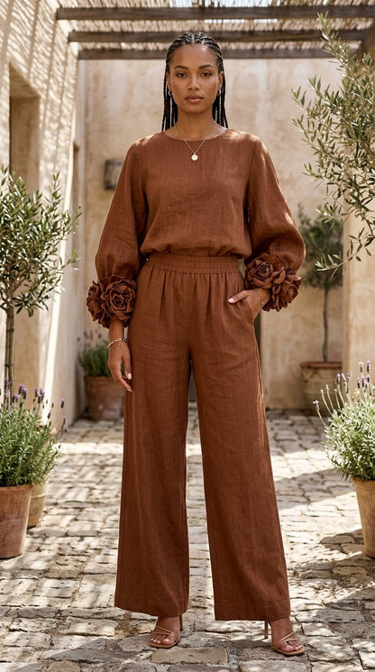 Completo con top dai polsini floreali e pantaloni ampi | Alessia Velluti