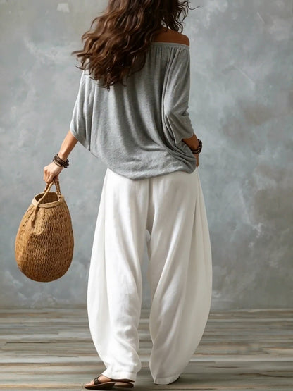 Marta | Completo de Top Blanco Off-the-shoulder y Pantaloni Lantern Holgados