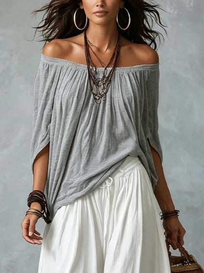 Marta | Completo de Top Blanco Off-the-shoulder y Pantaloni Lantern Holgados