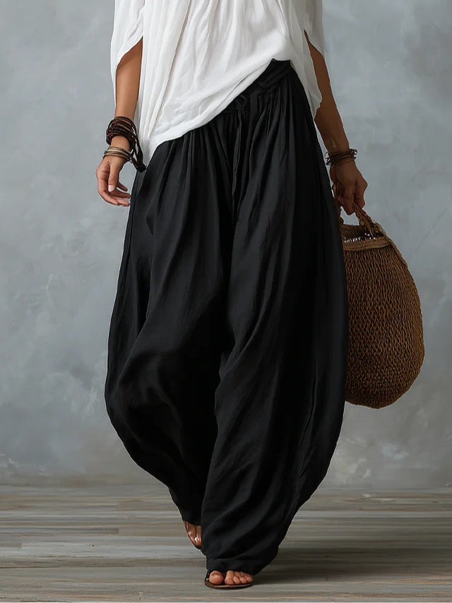 Marta | Completo de Top Blanco Off-the-shoulder y Pantaloni Lantern Holgados