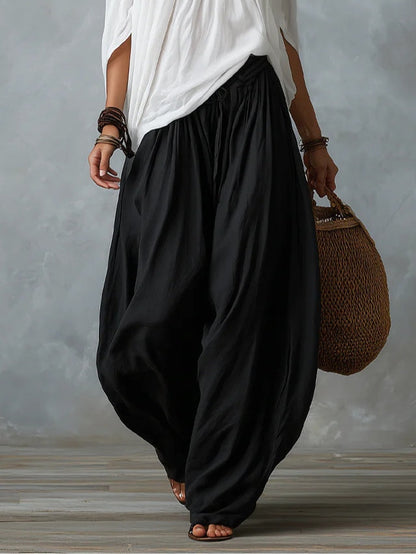 Marta | Completo de Top Blanco Off-the-shoulder y Pantaloni Lantern Holgados