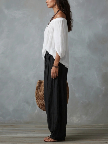 Marta | Completo de Top Blanco Off-the-shoulder y Pantaloni Lantern Holgados