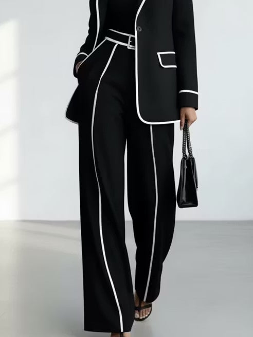 Completo Claudia nero con blazer, pantaloni ampi e profili bianchi | Alessia Velluti